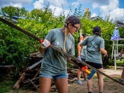 Student volunteers clearing debris