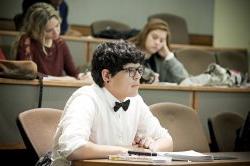 male student in lecture hall