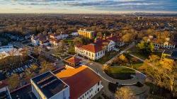 aerial photo of Montclair State campus looking toward NYC at sunset