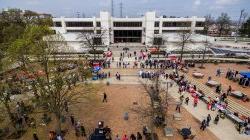 Aerial of Student Center with people in the Quad