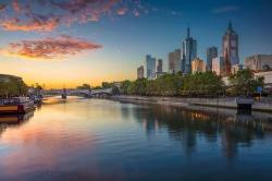 Cityscape image of Melbourne, Australia during summer sunrise.